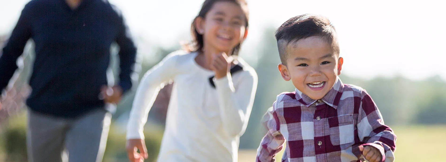 Siblings chasing each other